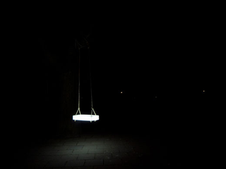 Illustration for article titled Swing Lamp Lets Kids Play in the Dead of Night